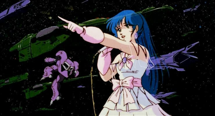 Still from Macross: Do You Remember Love? which features Lynn Minmay posing against flying mecha.