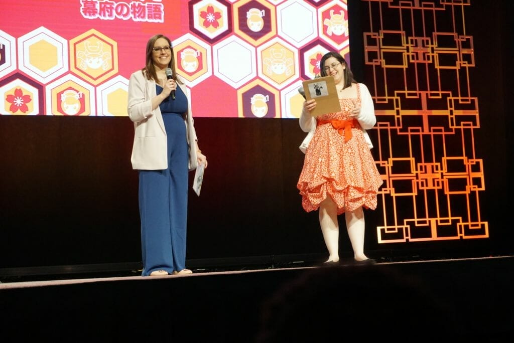 Anime Boston 2019 - Opening Ceremonies - convention chair Kristen Leiding and vice chair Jenna Leary Onstage