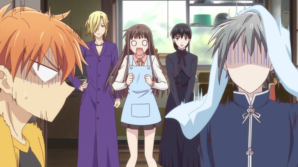 Fruits Basket (2019) Anime Still - Yuki Soma, Kyo Soma, and Tohru Honda stand in shock. Arisa Uotani and Saki Hanajima are in the background with nonplussed expressions.