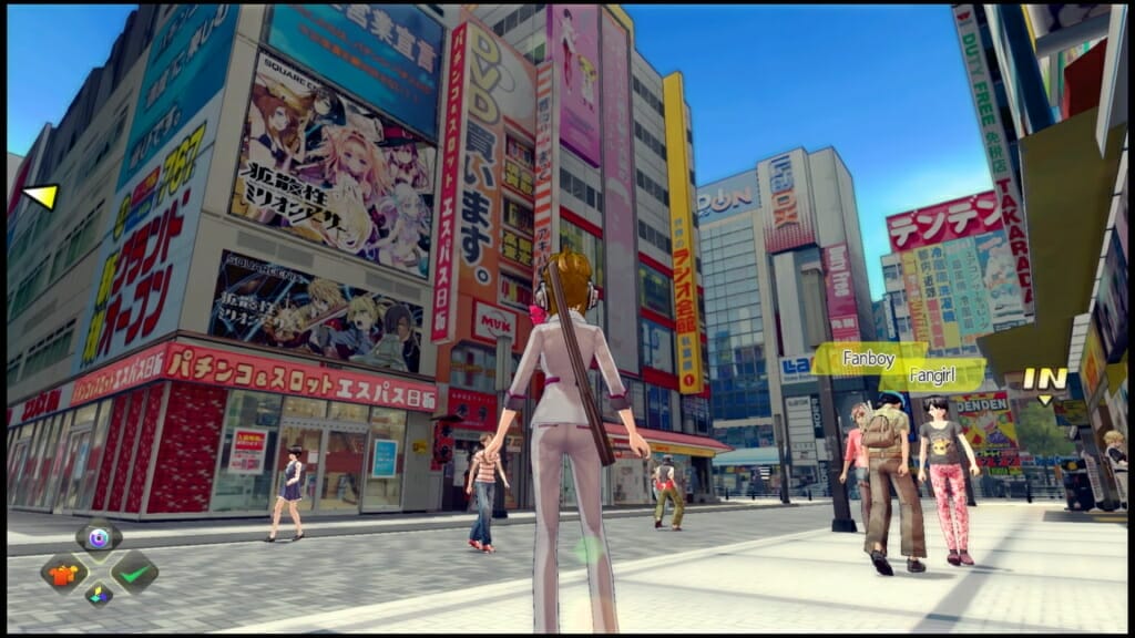 Akibas Trip PS4 Screenshot - A woman with brown hair, clad in a business suit stands before a cluster of Akihabara buildings decked out in advertisements.