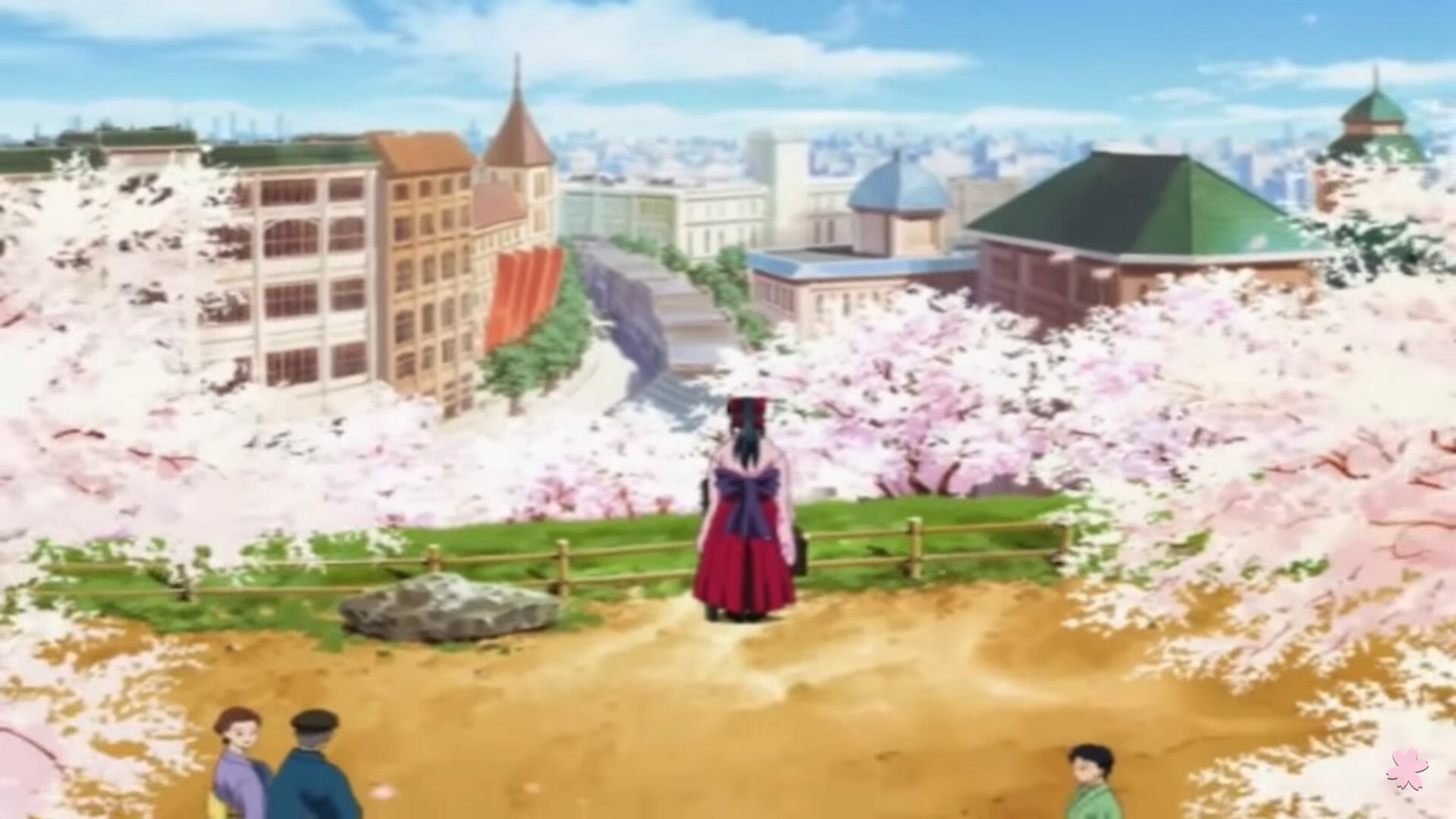 Sakura Wars Atsuki Chishio Ni Still - A young woman stands surrounded by blooming cherry blossoms. A sprawling city spreads before her in the background.