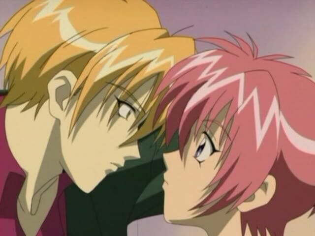 Gravitation anime still - two boys stare into each others' eyes