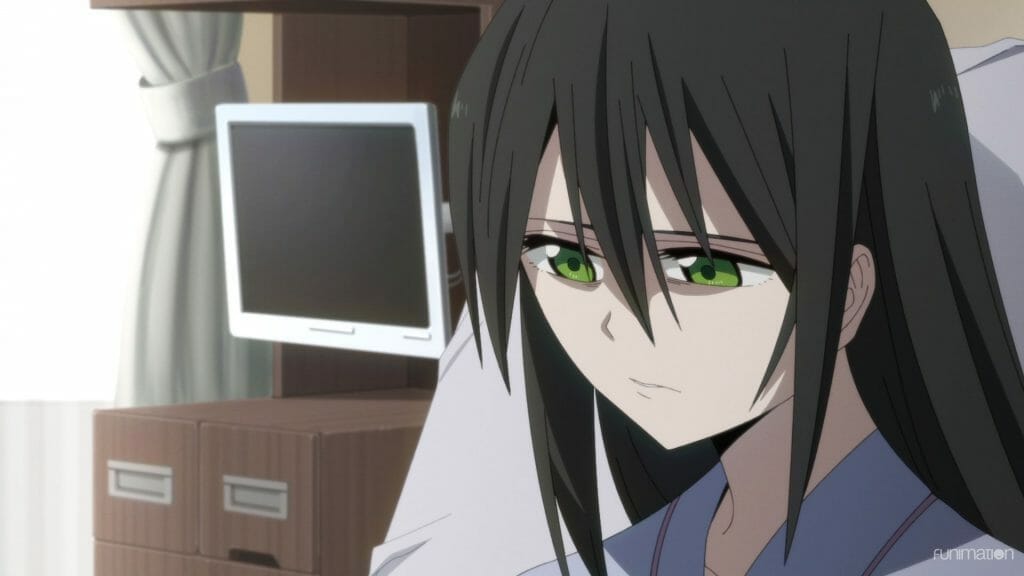 Id: Invaded Episode 10 Still - Close-up of a sad raven-haired woman with green eyes.