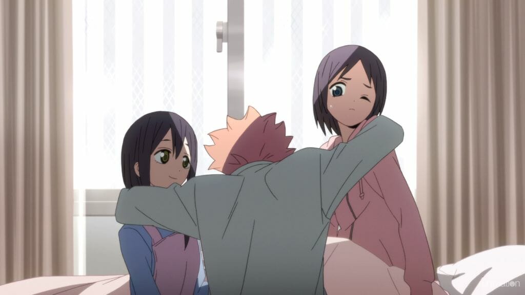 Id Invaded Episode 9 still - A man with pink hair faces away from the camera as he hugs a woman and a girl, both of whom have purple hair