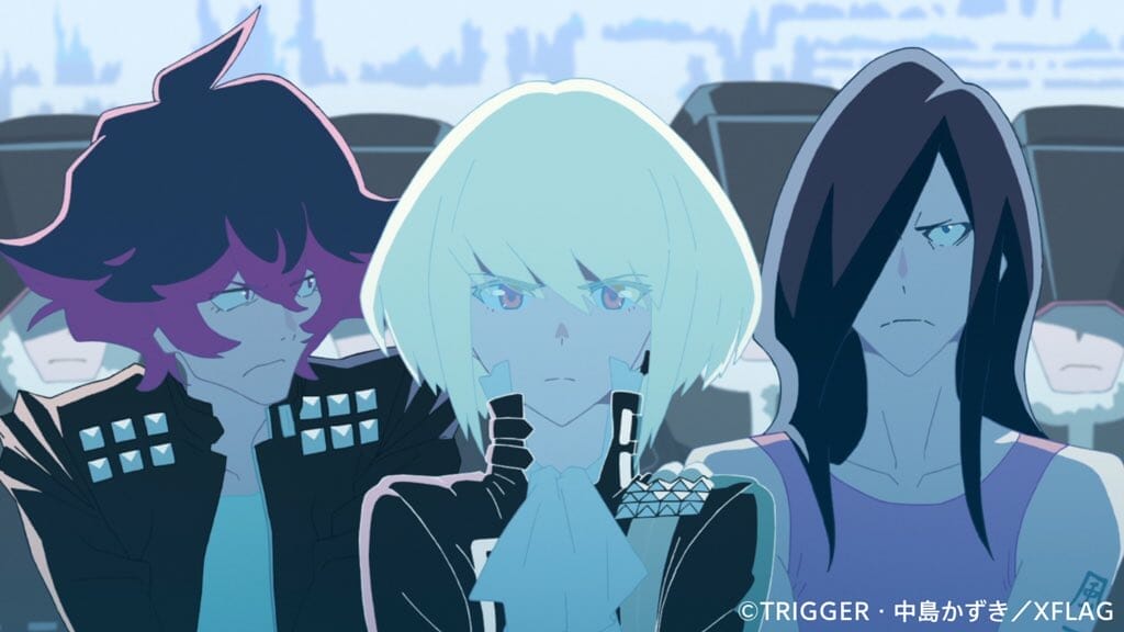 Promare Still - A blonde man, a man with purple hair, and a man with long black hair all stand before a city skyline.