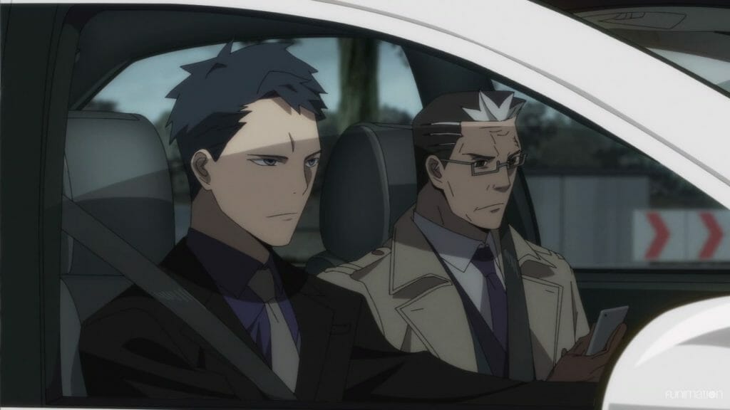 Id Invaded Episode 12 Still - two men in suits in a white car, each with stern expressions
