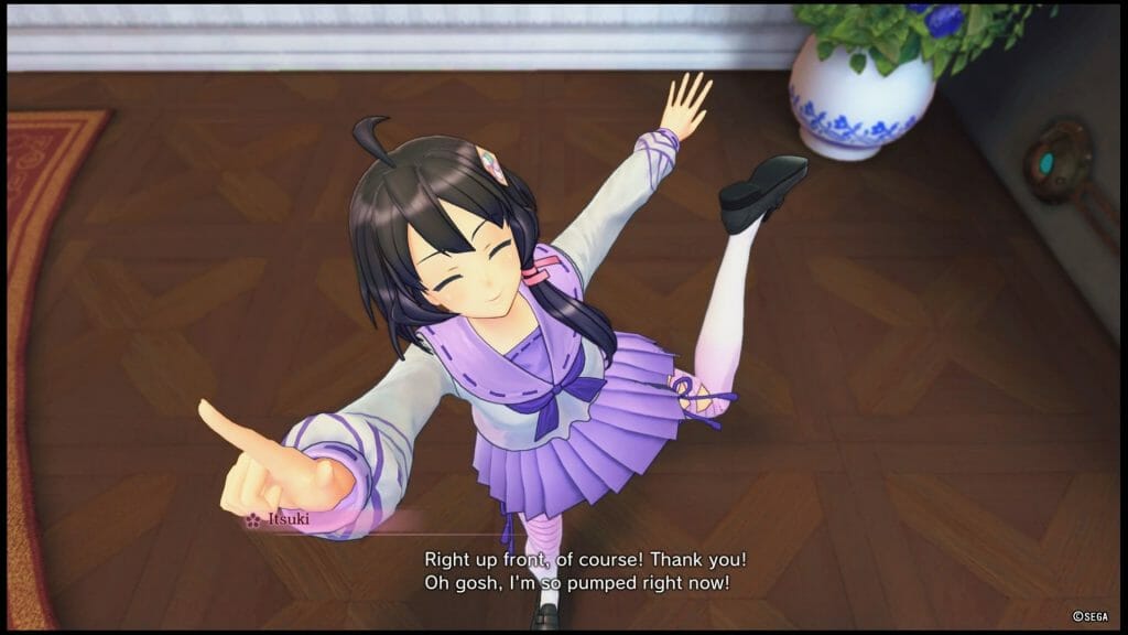 Sakura Wars 2019 game still - A dark-haired girl in a purple school uniform poses excitedly. Dialogue: "Right up in front, of course! Thank you! Oh gosh, I'm so pumped right now!"