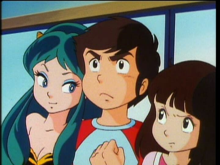 Urusei Yatsura Anime Still - A brown-haired man poses stoically as he's hugged by a green-haired woman in a bikini and a black-haired woman in a pink top