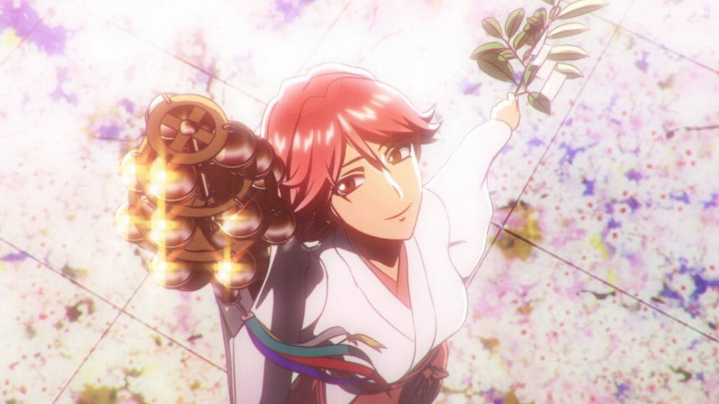 A red-haired woman dressed as a shrine maiden smiles as she looks up. She's holding a bell and a leaf.