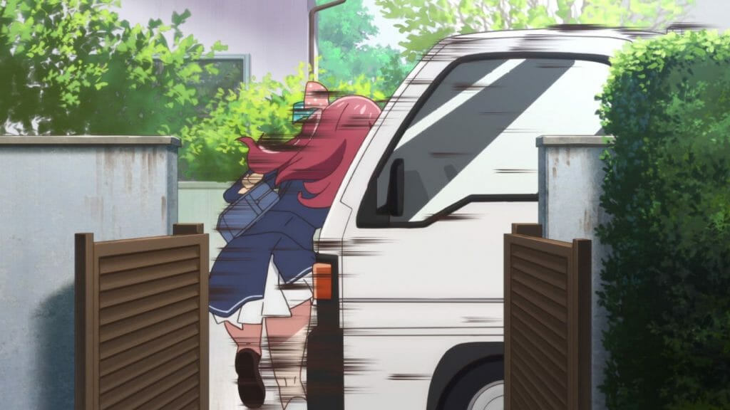A red-haired girl gets hit by a truck.