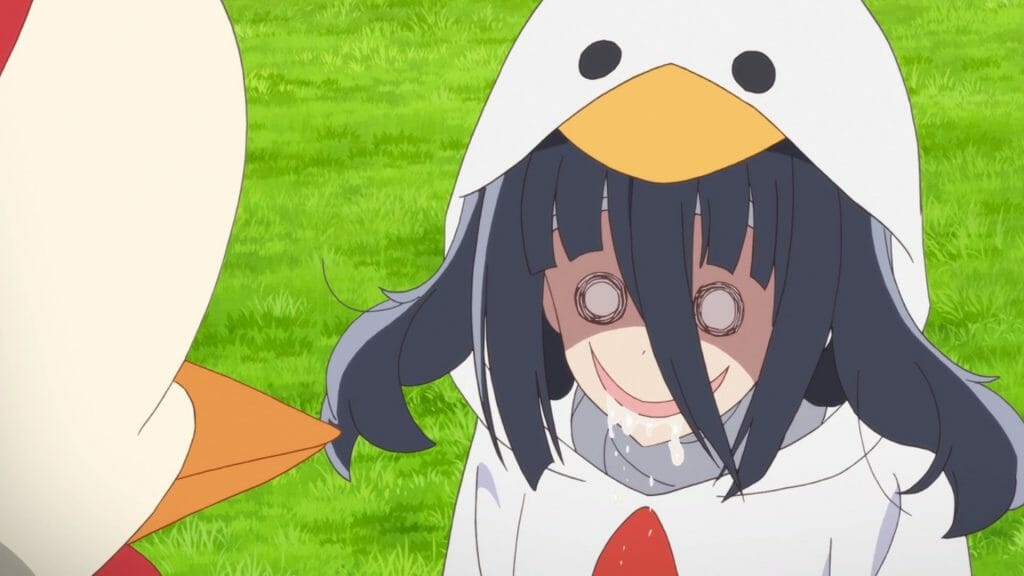 A black-haired woman stares at a chicken mascot, her mouth dripping with drool as it twists into a dark grin.