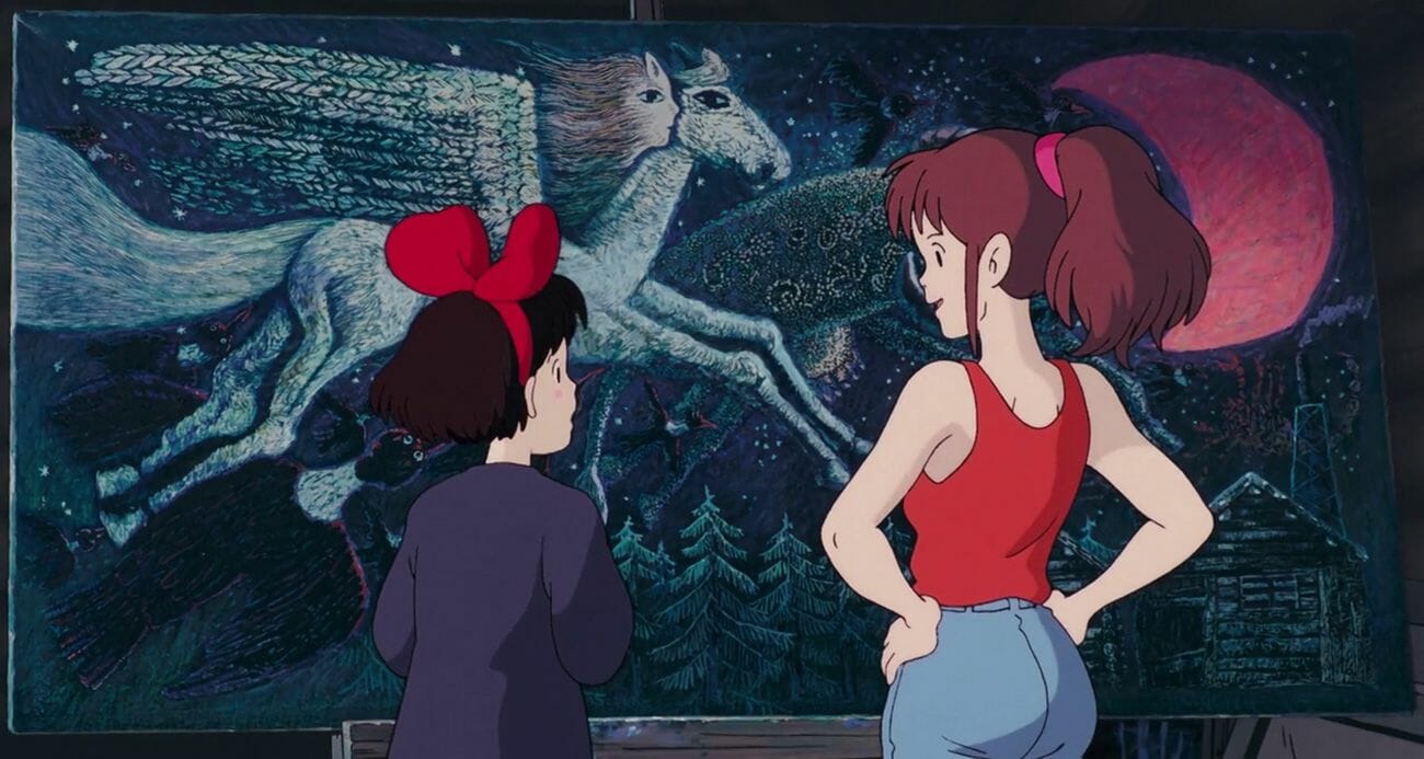 Still from Kiki's Delivery Service, which features Kiki standing in front of a painting as she talks with Ursula.