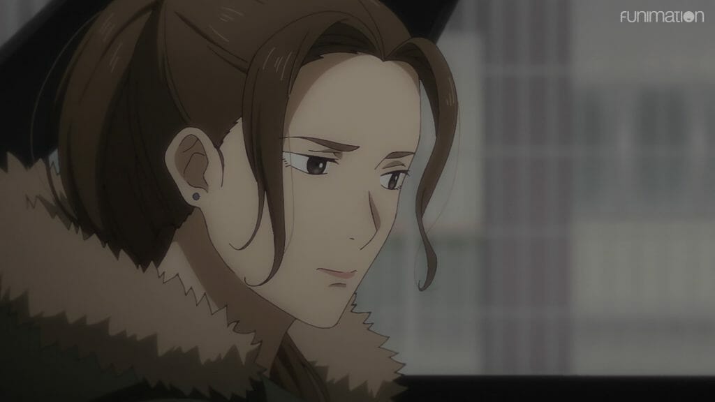 still from Ikebukuro West Gate Park episode 4, depicting a brown-haired woman, who frowns pensively