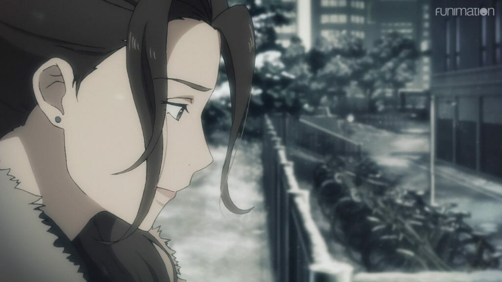 still from Ikebukuro West Gate Park episode 4, depicting a brown-haired woman who smiles sadly as she looks off-camera.