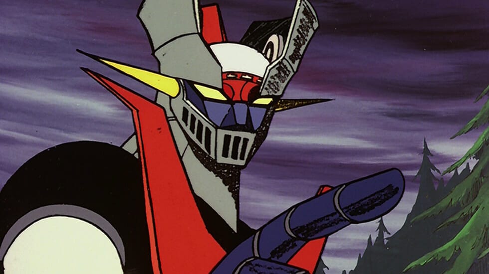 Headshot of Mazinger Z: a giant grey robot with yellow eyes and red accents