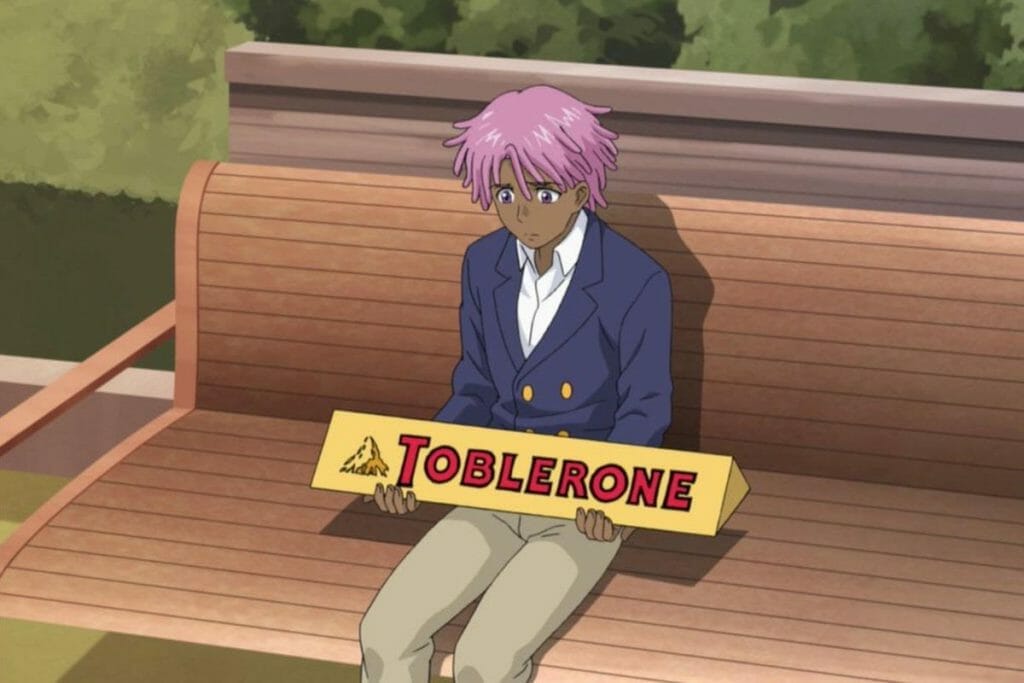 Kaz Kaan from Neo Yokio, sitting on a park bench with his famous Big Toblerone