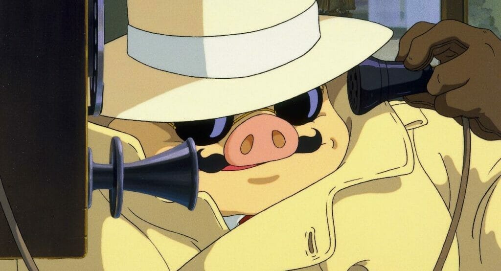 Still from Porco Rosso that depicts a man in a fedora and yellow coat, with a pig head, talking on a pay phone.