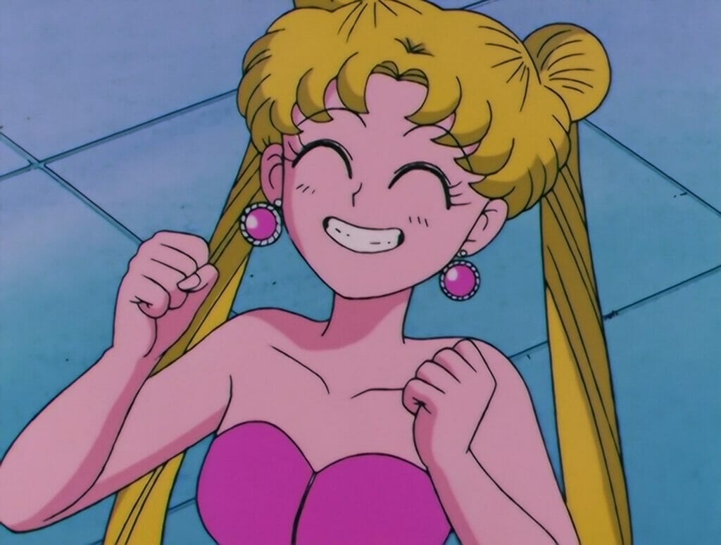 Usagi grinning happily in a pink opera dress