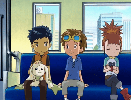 Digimon Tamers' three main characters sitting together on a train
