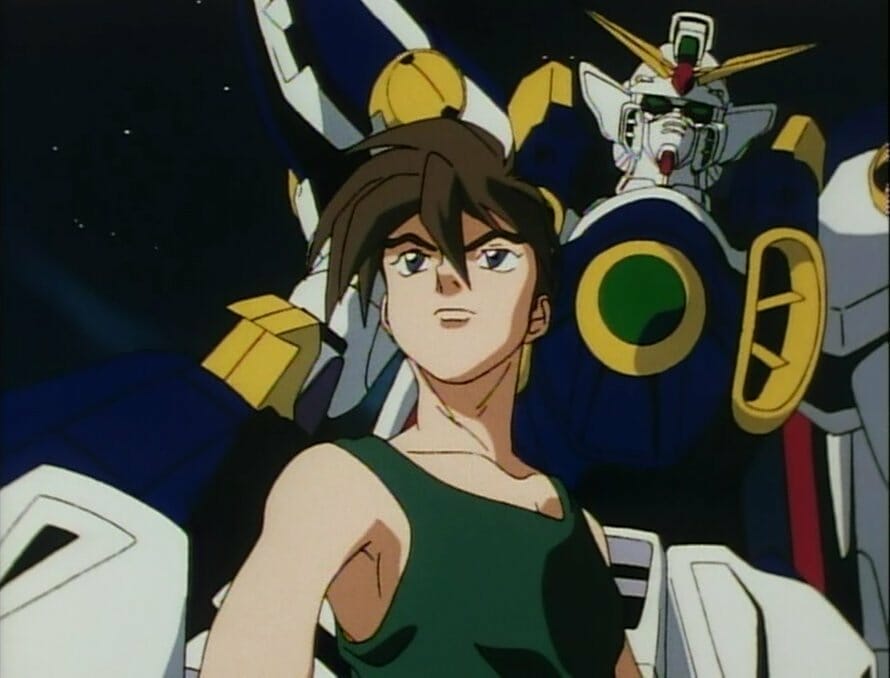 Image from Mobile Suit Gundam Wing, which depicts Heero Yuu standing in front of the Wing Gundam