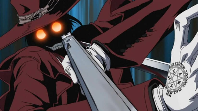 Alucard from Hellsing Ultimate grins maniacally as he aims his pistol at the camera.