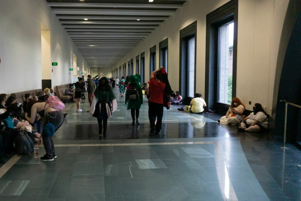 Photo of people walking through the halls of the Hynes Convention Center on Sunday of Anime Boston 2022.