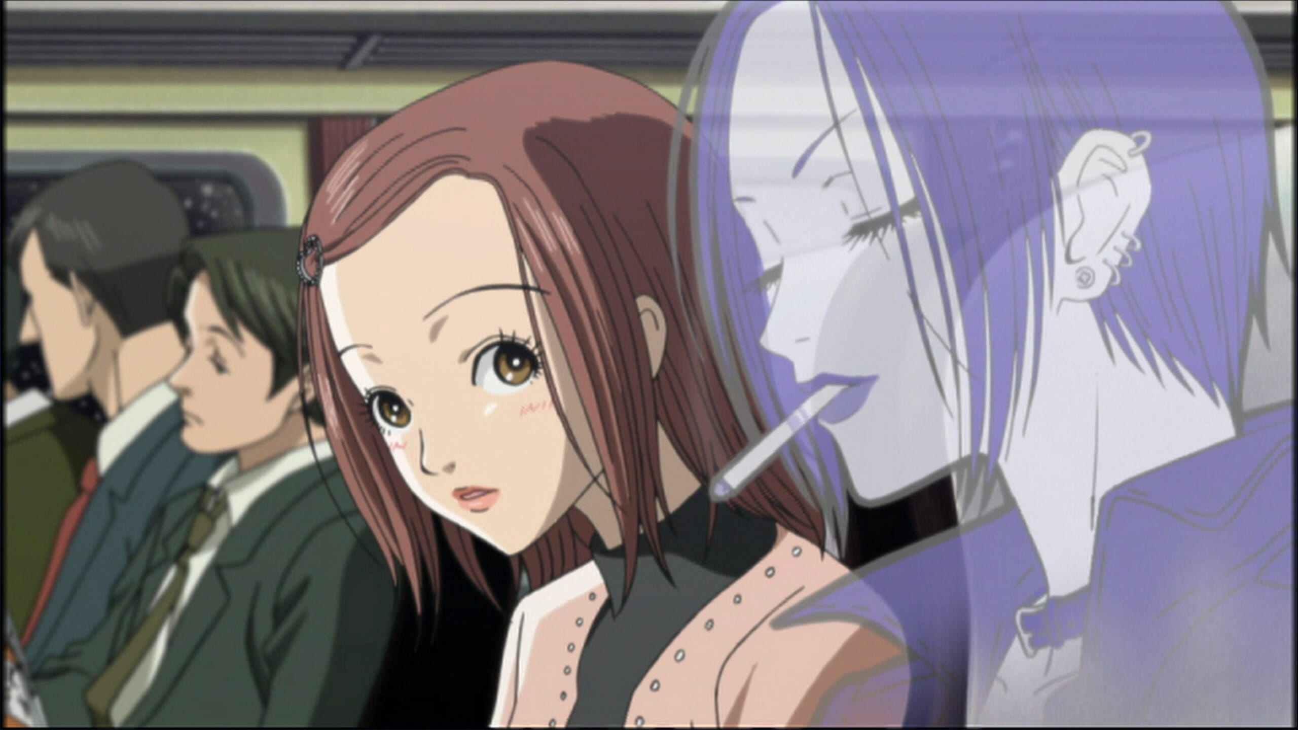 Still from the Nana anime, which depicts a brown-haired woman as she look sat the spectral image of a raven-haired woman who is smoking a cigarette.