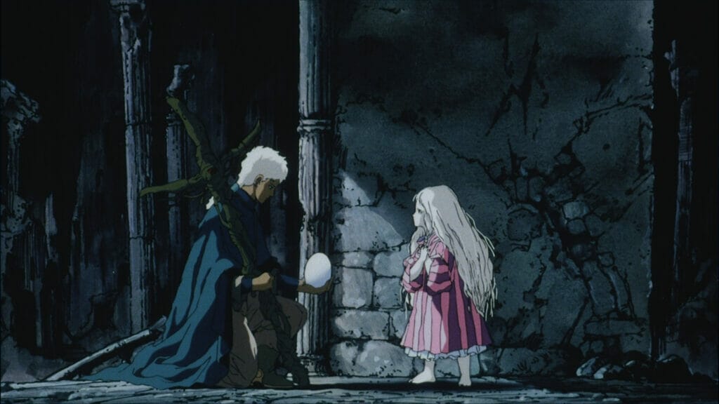 Still from Angel's Egg. A sullen blonde girl wearing a pink dress stares at a mysterious blonde man in a dark cloak, who is bearing a cross-shaped piece of wood.