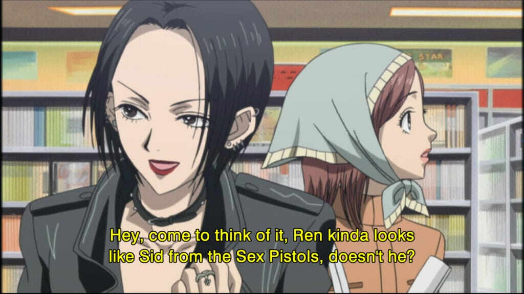 Vẫn từ anime NANA, trong đó Nana Osaki nhếch mép cười trước một Nana Komatsu không biết gì.  Chữ: "Này, nghĩ lại thì, Ren trông giống Sid trong Sex Pistols, phải không?"