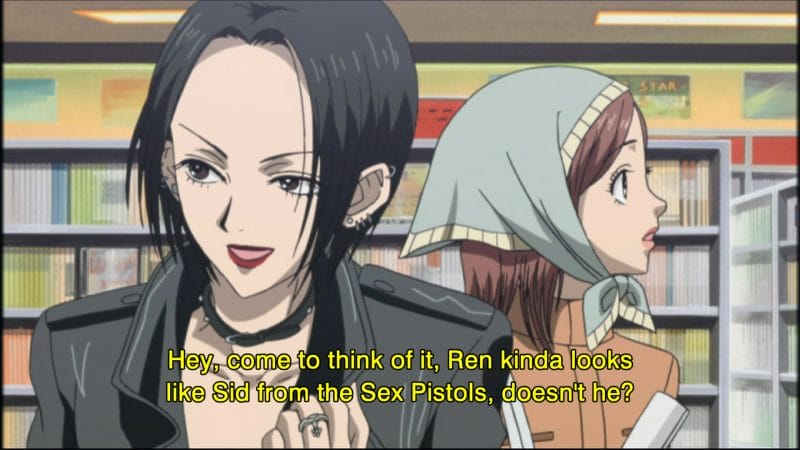 Still from the NANA anime, in which Nana Osaki smirks in front of a clueless Nana Komatsu. Text: "Hey, come to think of it, Ren kinda looks like Sid from the Sex Pistols, doesn't he?"