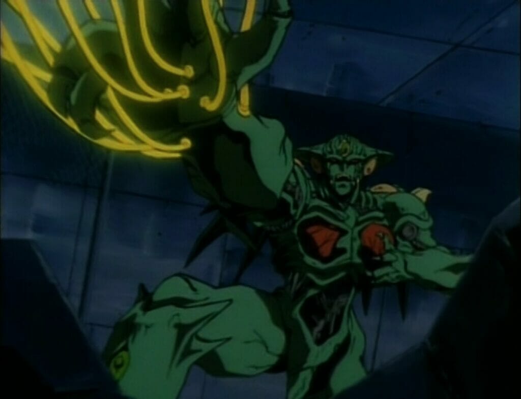Screenshot from Genocyber. A green humanoid monster launches yellow tendrils from its arm.