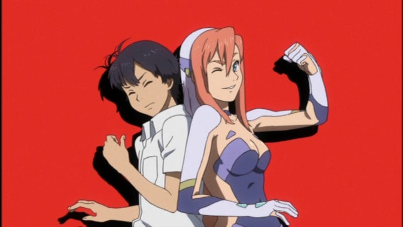 Screenshot from Birdy the Mighty: Decode 02 that depicts a pink-and-white haired woman flexing her bicep as she leans against a black-haired boy in a white dress shirt.