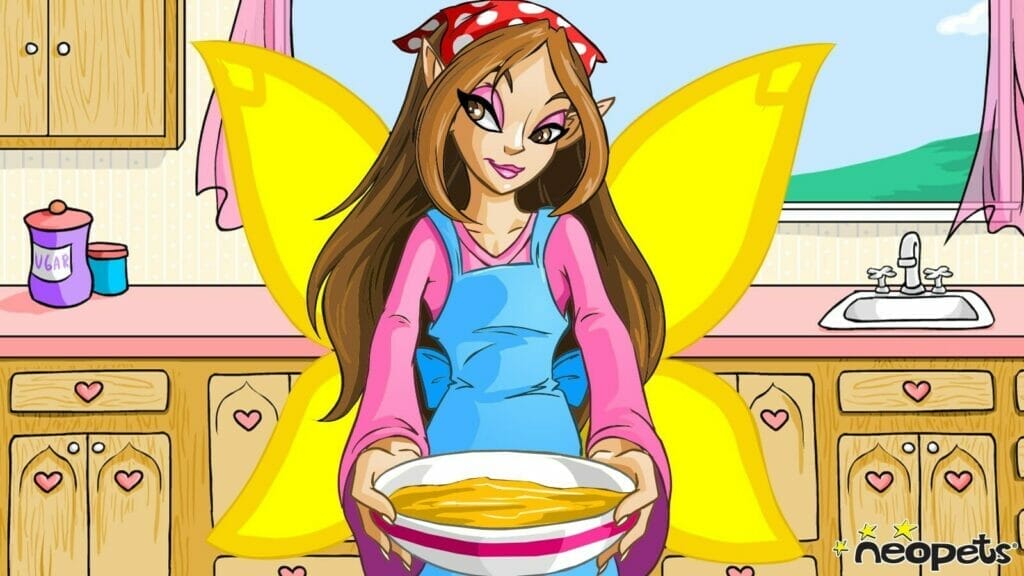 A woman with fairy wings, wearing coveralls and a polka-dotted head scarf holds a bowl as she stands in the kitchen.