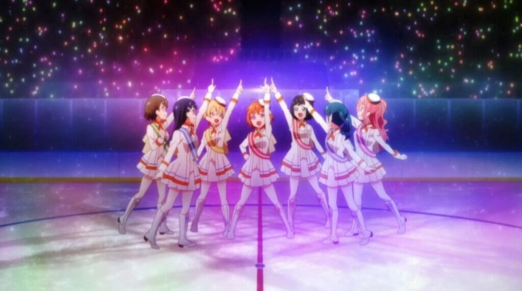 Screenshot from PuraOre! Pride of Orange that depicts six girls on a hockey rink, dressed as idols.