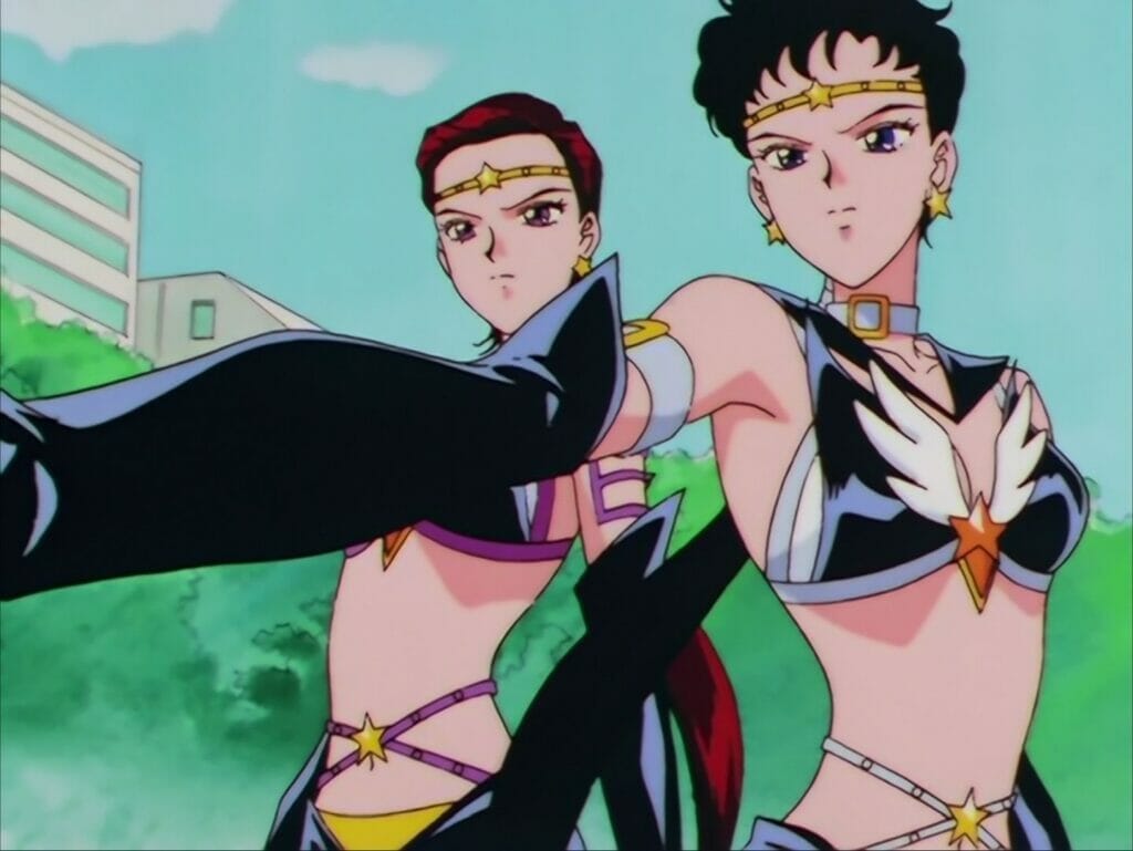 Screenshot from Sailor Stars that depicts two members of the Sailor Starlights posing against a city background.