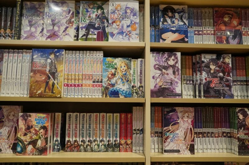 Various manga books arranged for sale in a bookshop in Dubai, UAE.