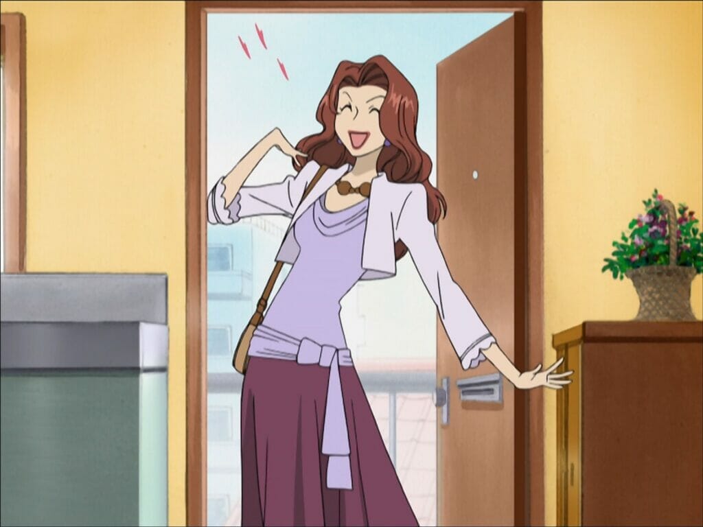 Screenshot from Ouran High School Host Club that depicts a woman with long brown hair, wearing casual clothes. She's posing happily through an open door.