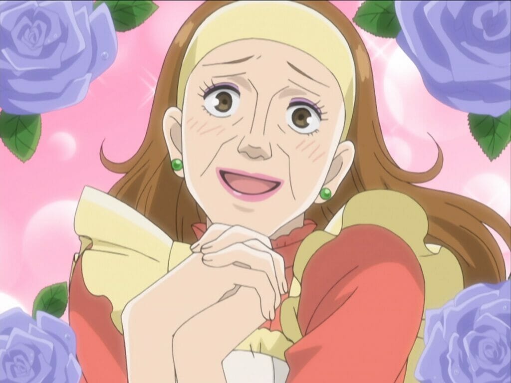 Screenshot from Ouran High School Host Club that depicts a middle-aged woman with long brown hair, wearing a red dress and yellow apron, swooning and blushing.
