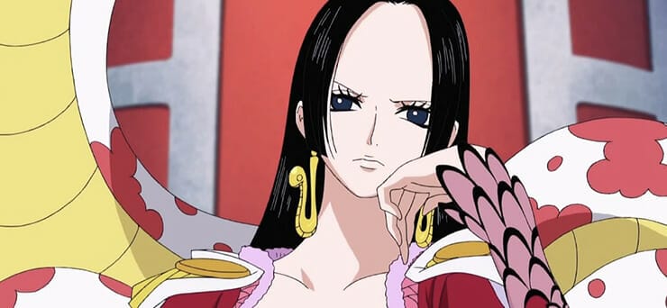 Screenshot from One Piece that depicts Boa Hancock frowning as she stands before a giant serpent.