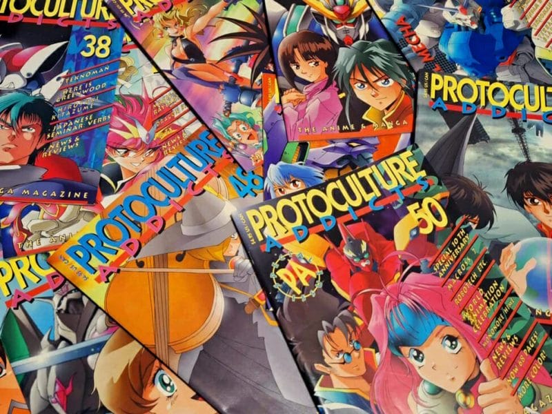 Photo of a pile of Protoculture Addicts magazines taken from the magazine's entire run.