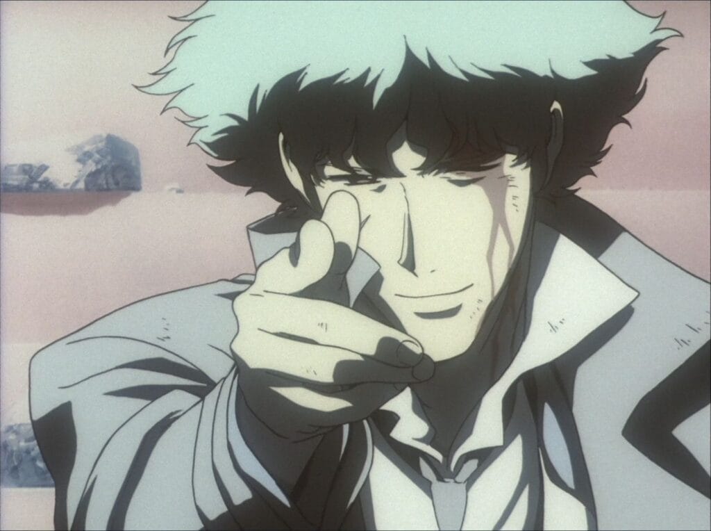 Screenshot from Cowboy Bebop that features Spike, bloodied and wounded, pointing at the camera with a satisfied smirk.