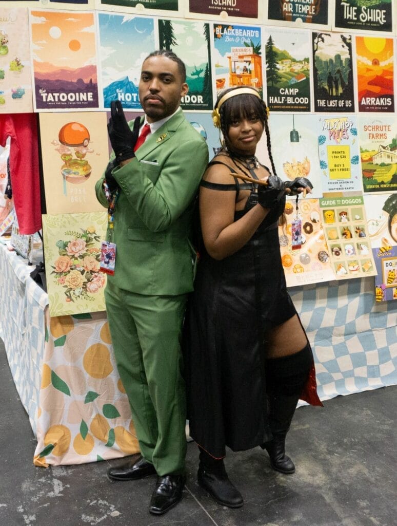 Cosplayers at Anime NYC 2023, dressed as Loid and Yor Forger from Spy x Family