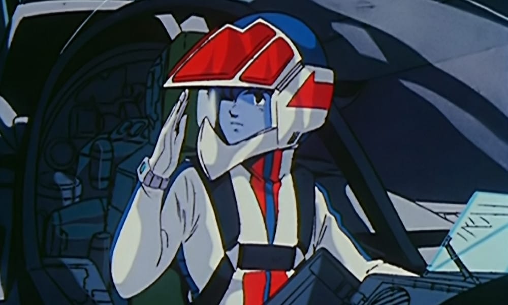 Screenshot from Robotech that depicts Rick Hunter saluting in his flight suit.