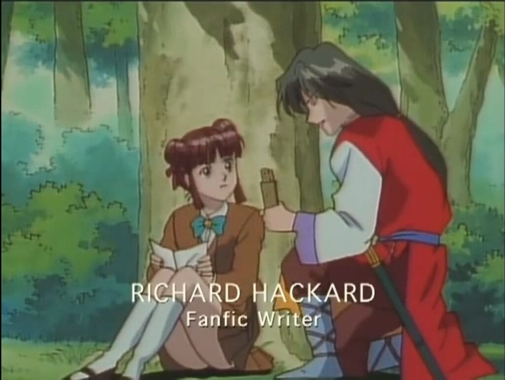 Screenshot from This Is Otakudom, depicting a scene from Fushigi Yugi which has Miaka looking at Hotohori.Text: "Richard Hackard: Fanfic Writer"