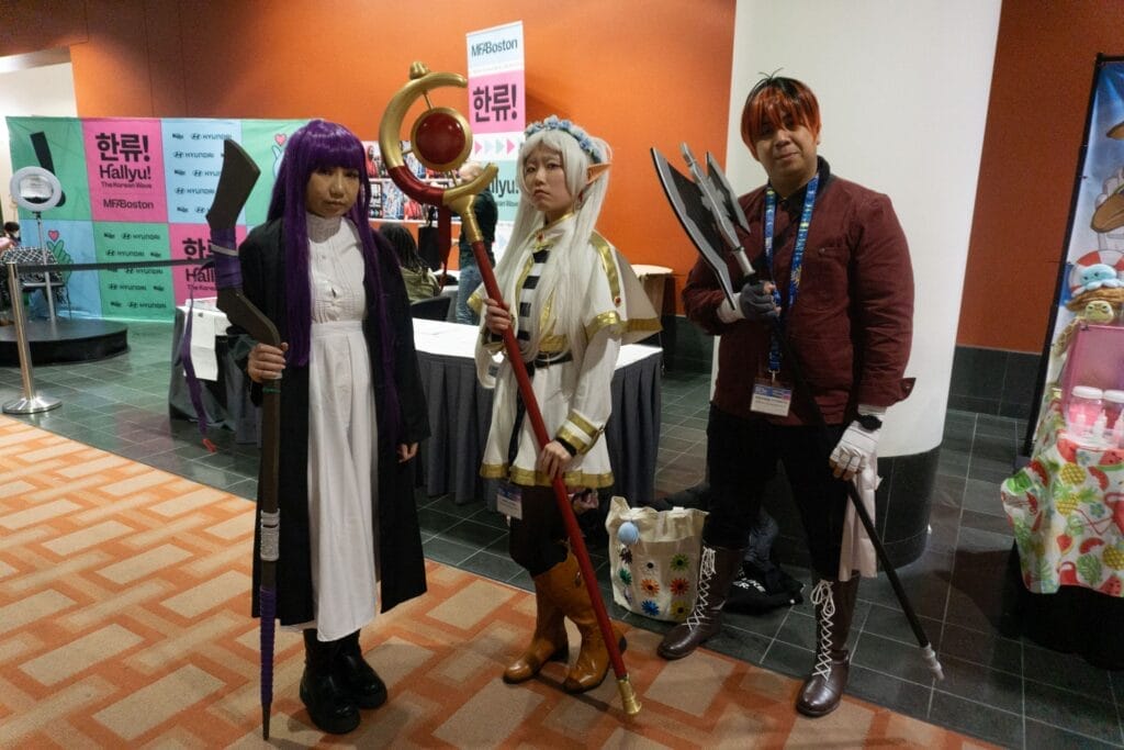 Photo of a cosplayer  dressed as Frieren, Fern, and Stark from Frieren: Beyond Journey's End