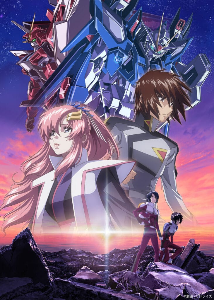Key visual for Mobile Suit Gundam Seed FREEDOM that depicts Kira and Lacus standing against a crimson sky, their mobile suits superimposed behind them.