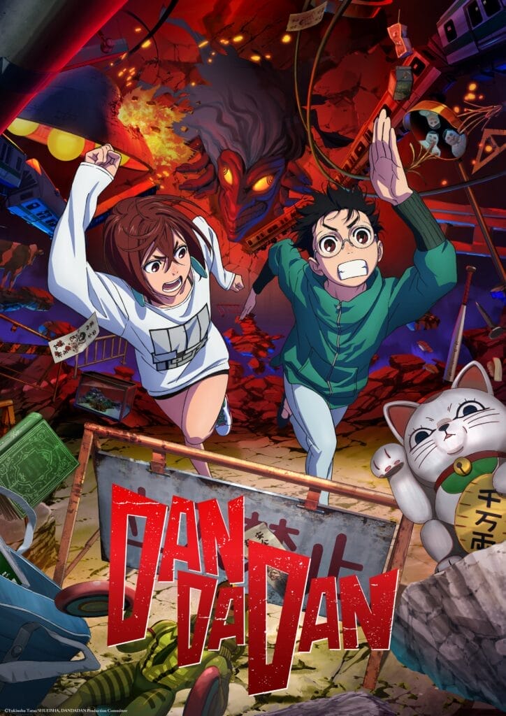 Key visual for DAN DA DAN depicting Momo Ayase, a red-haired woman in a white shirt and shorts, running next to Ken Takakura, a nerdy boy wearing a green sweatshirt and glasses. They try to escape a demon chasing them, while objects such as a roadblock and a manekikeko statue stand in their way.