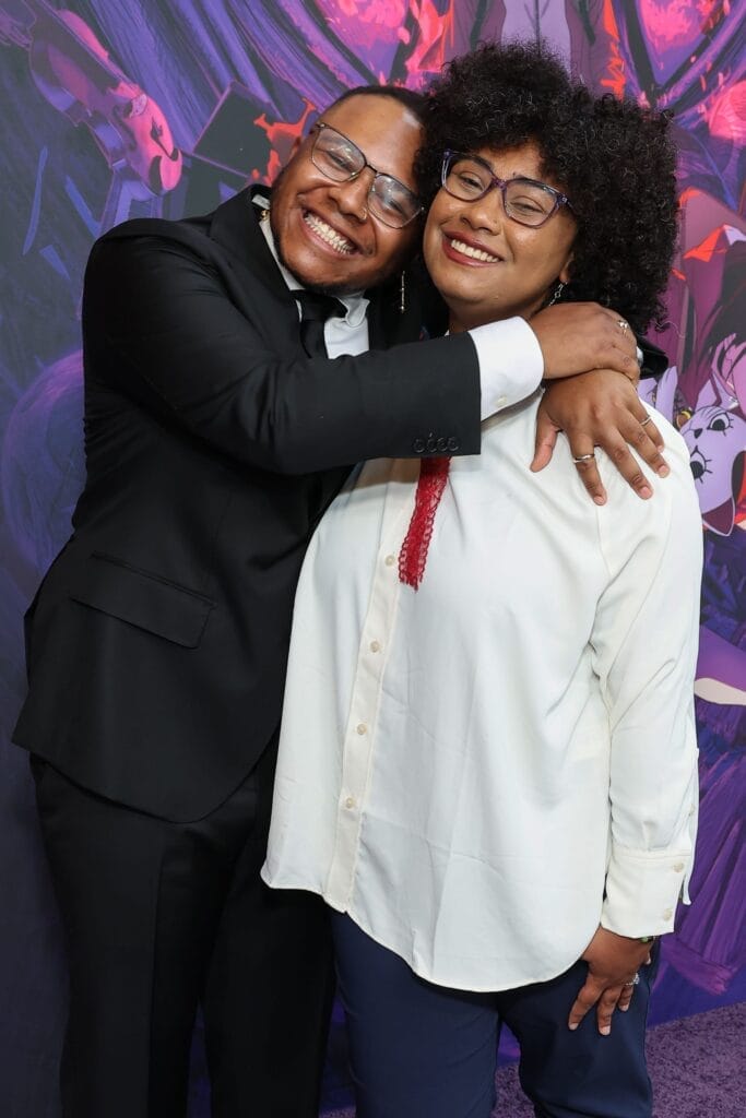 Photograph of AJ Beckles and Anairis Quiñones happily embracing each other.
