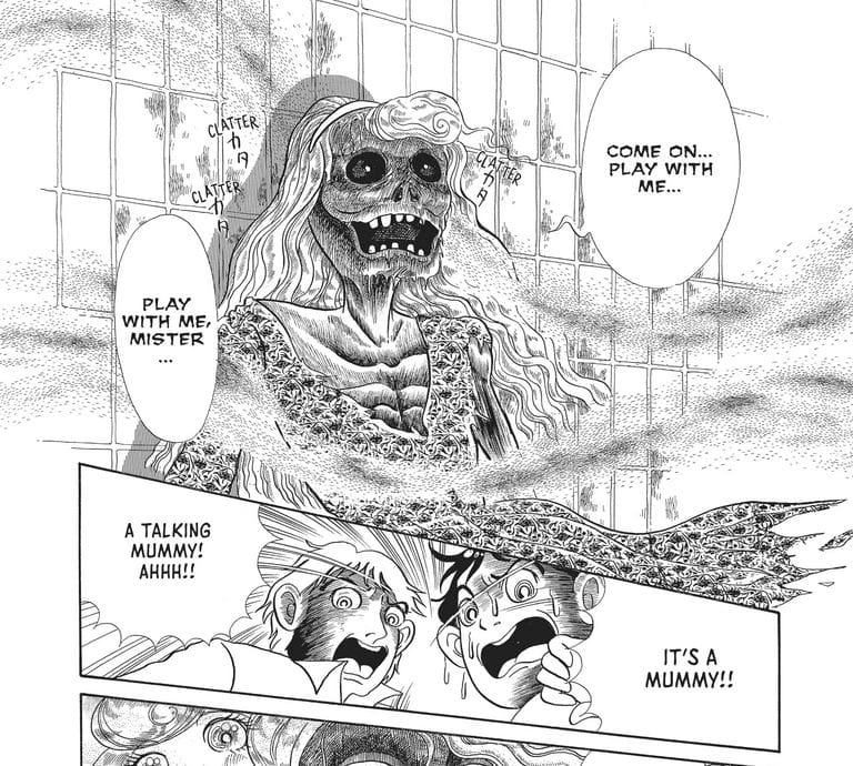 Panels from "Be Afraid of Kanako Inuki" that depicts a desiccated mummy grinning at an offscreen intruder. She's saying "Come on... Play with me... Play with me, mister..."
The second panel features two men visibly freaking out.
Speech bubble: "It's a Mummy! A Talking mummy! AHHH!!"