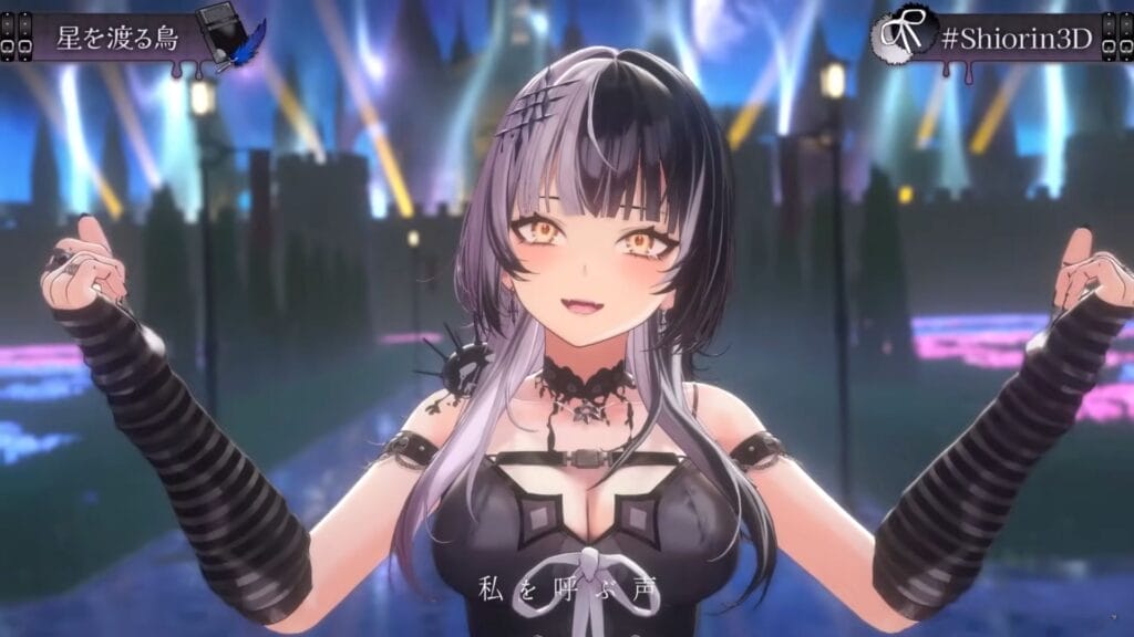 Still from a Hololive 3D stream for Shiori Novella, a femane VTuber with two-toned hair and a goth aesthetic. She's smiling as she sings in front of an elaborate dark fantasy set.